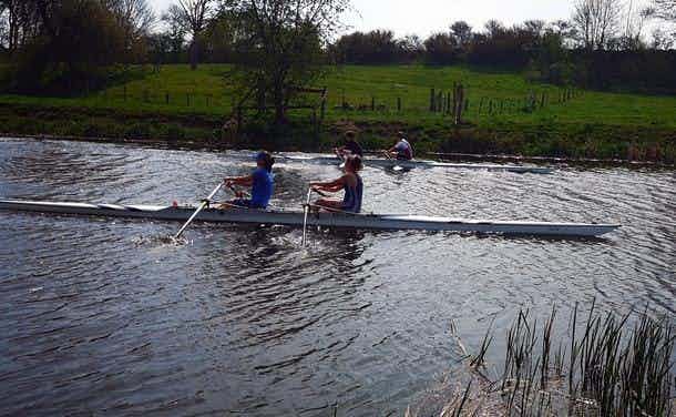 Two doubles approach the finishing post during the Good Friday opening races. 