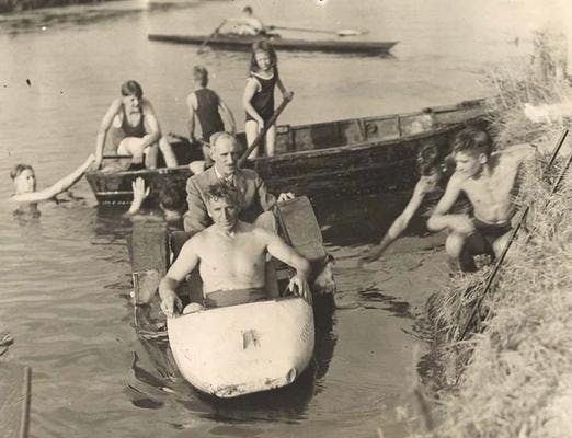 At the first post-war regatta, the town mayor took a ride in a homemade pedalo.